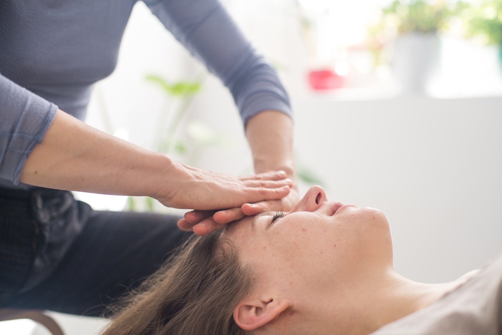 Woman practicing Somatic movement in her Health Studio, Awareness through movement, embodiment and Feldenkrais Method